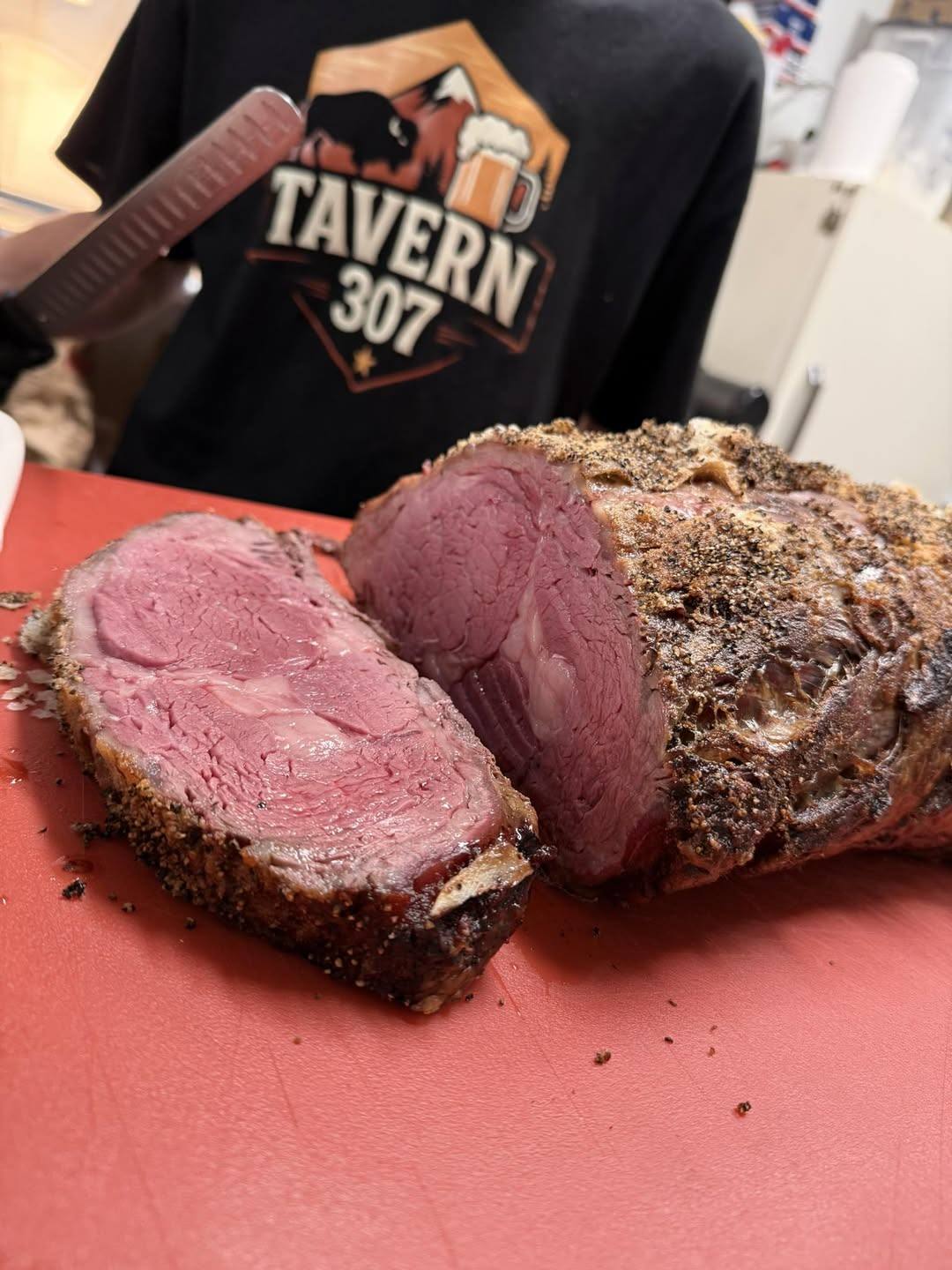Freshly carved prime rib on the cutting board in the Tavern 307 kitchen